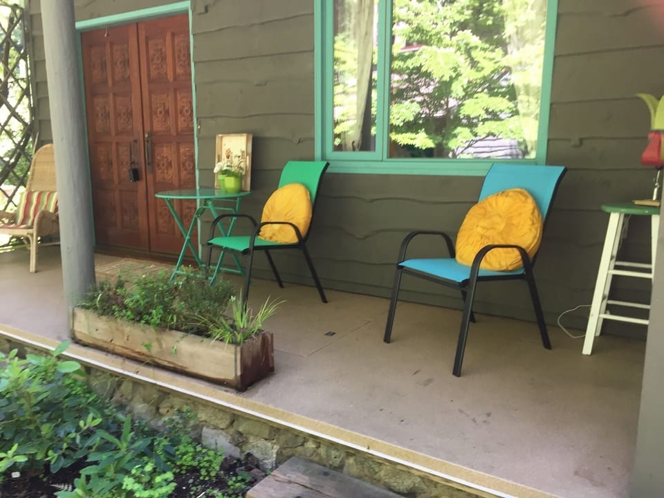 Front  doors. Porch overlooking garden  .