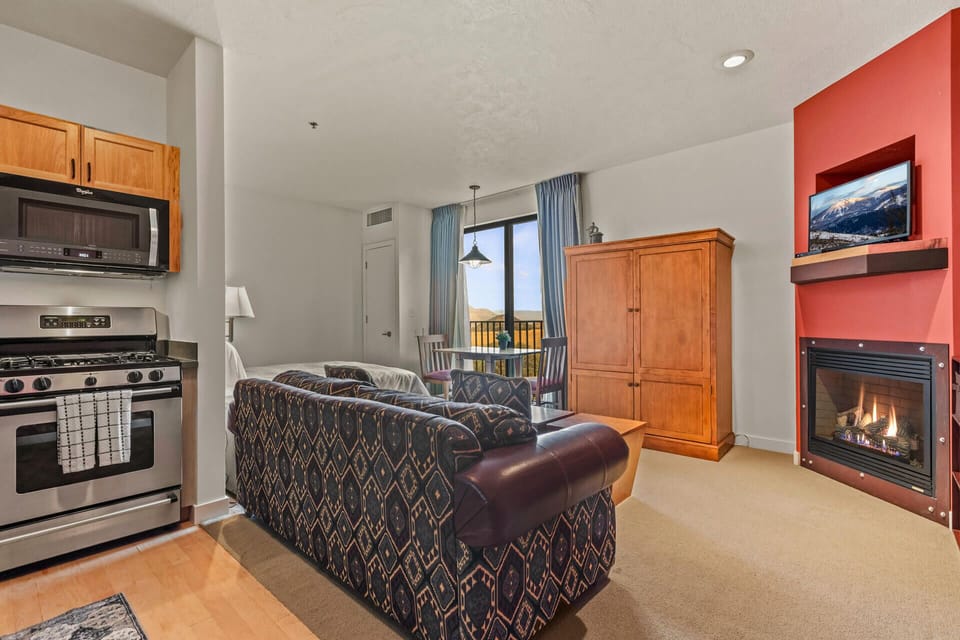 The Mason at Stillwater 3005: Cozy Studio Caption: "Bed, sofa, kitchen in the cozy studio."