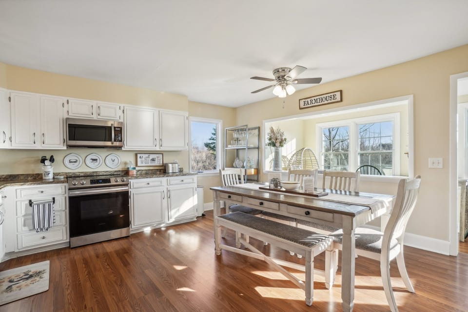 Gather and enjoy meals in the spacious, fully stocked kitchen.