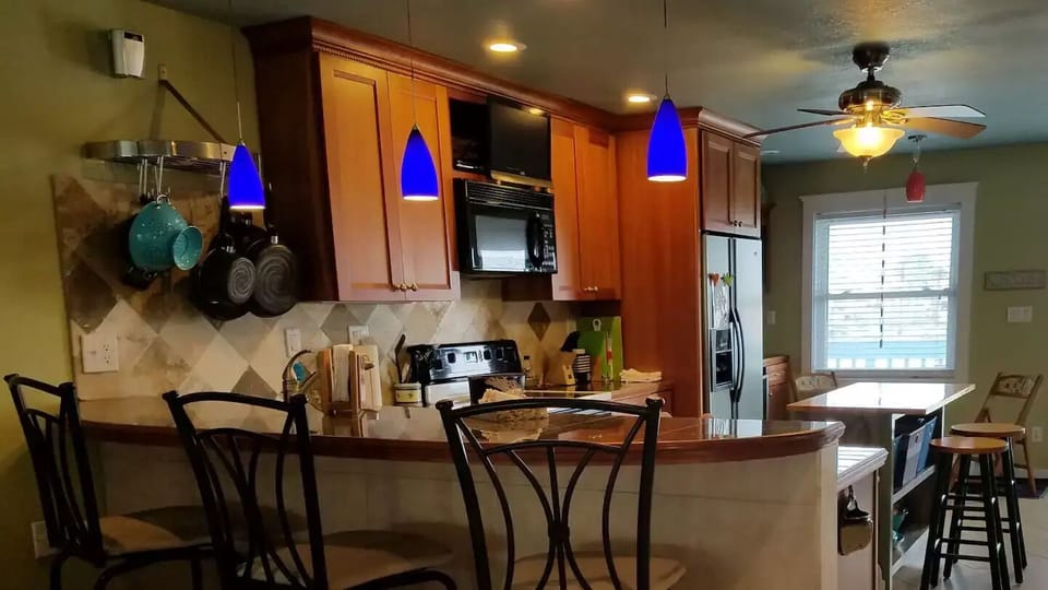 Upgraded Cherry Kraftmaid cabinets & Granite tile tops