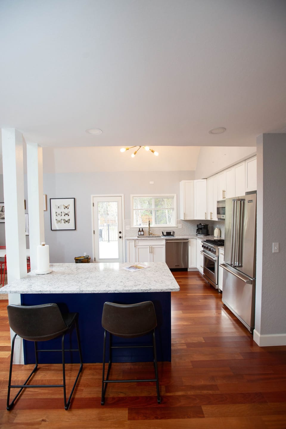 Kitchen island and peek into the back deck/yard