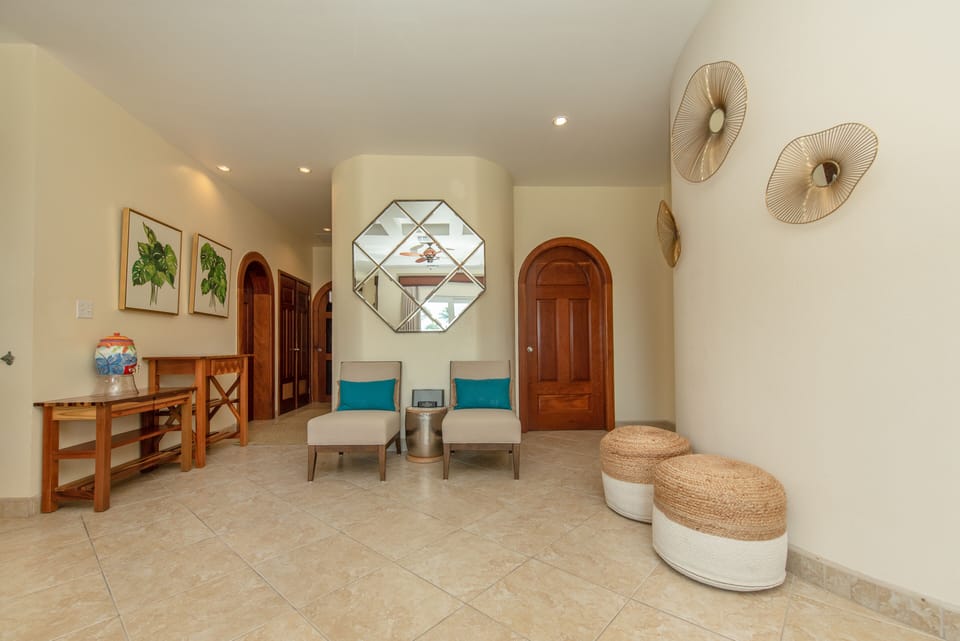 Part of living area and entry hallway