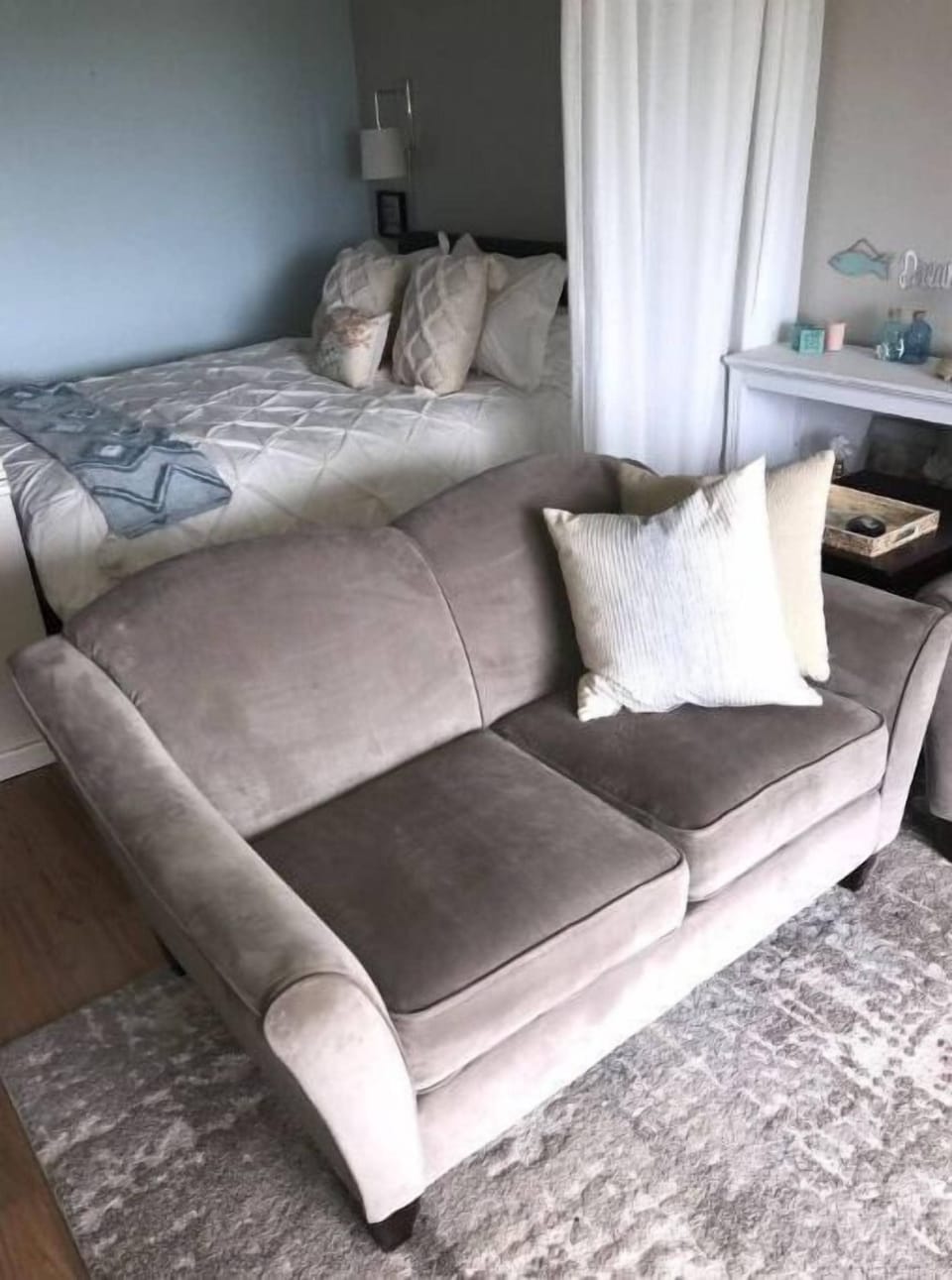 A curtain provided to minimize glare from the wonderful view.