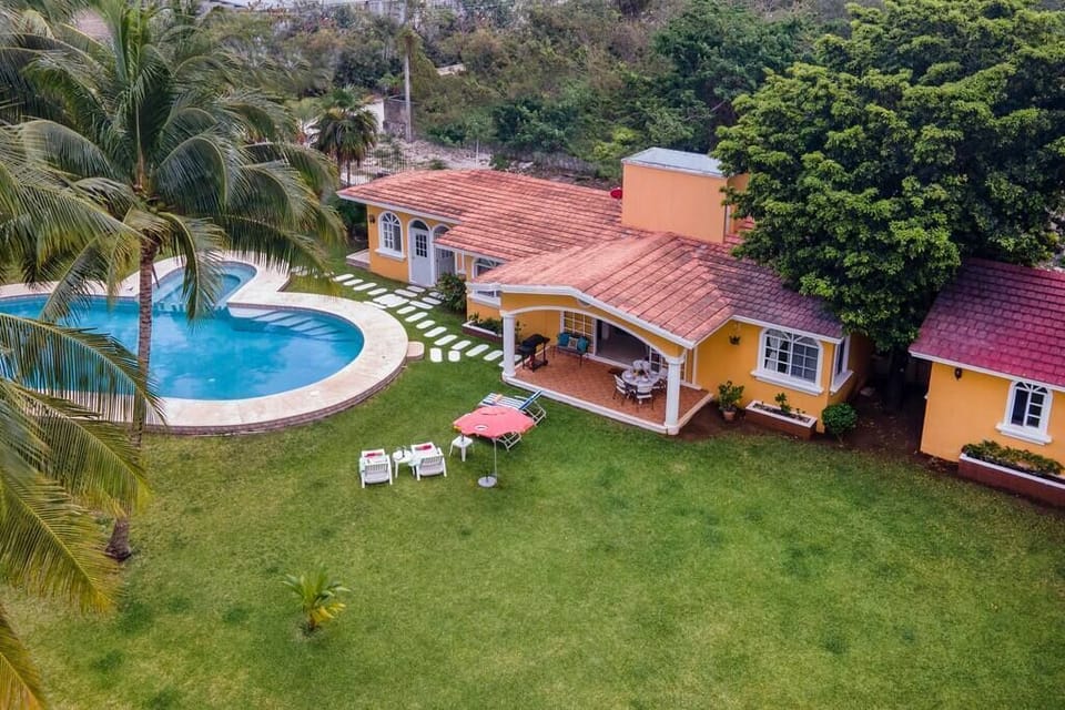 Private outdoor pool with chairs