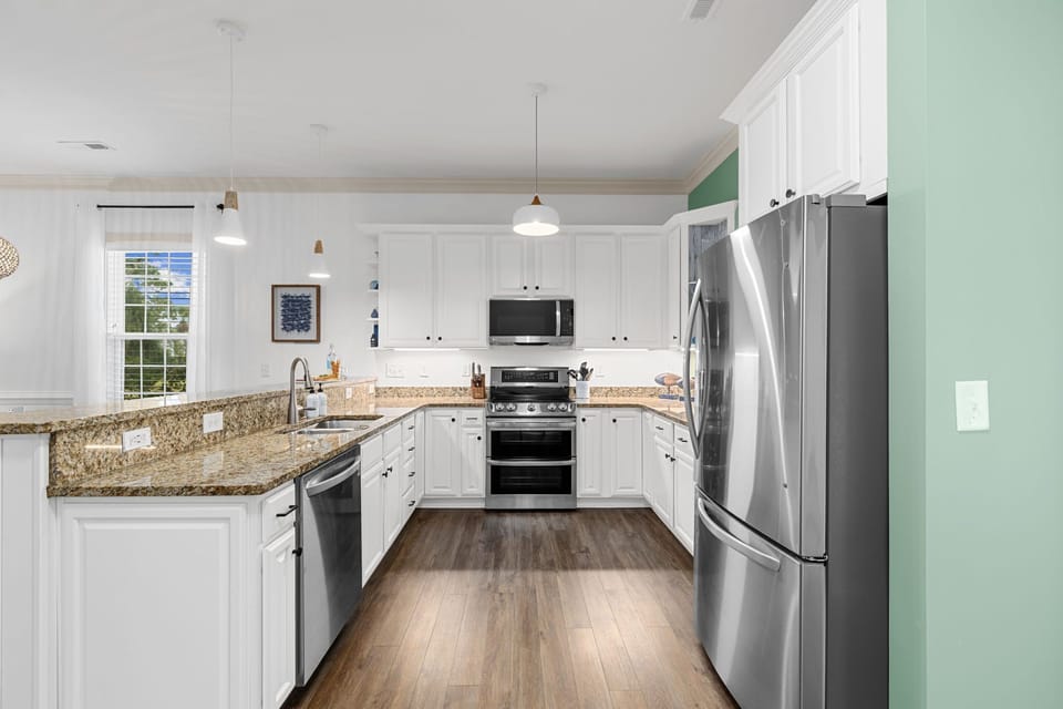 Large beautiful spacious kitchen with stainless steel appliances