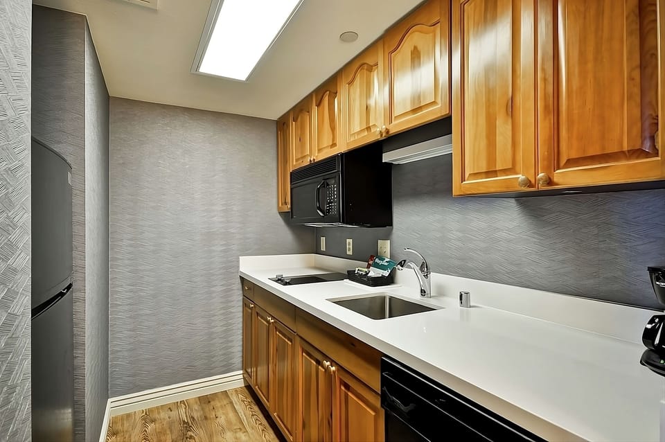Cook and sip coffee easily in the bright kitchenette.
