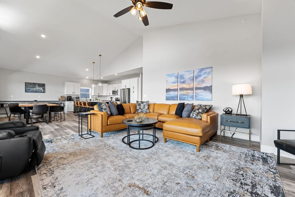 Wake up to calm lake views and prepare meals in the fully equipped kitchen within the open living space.