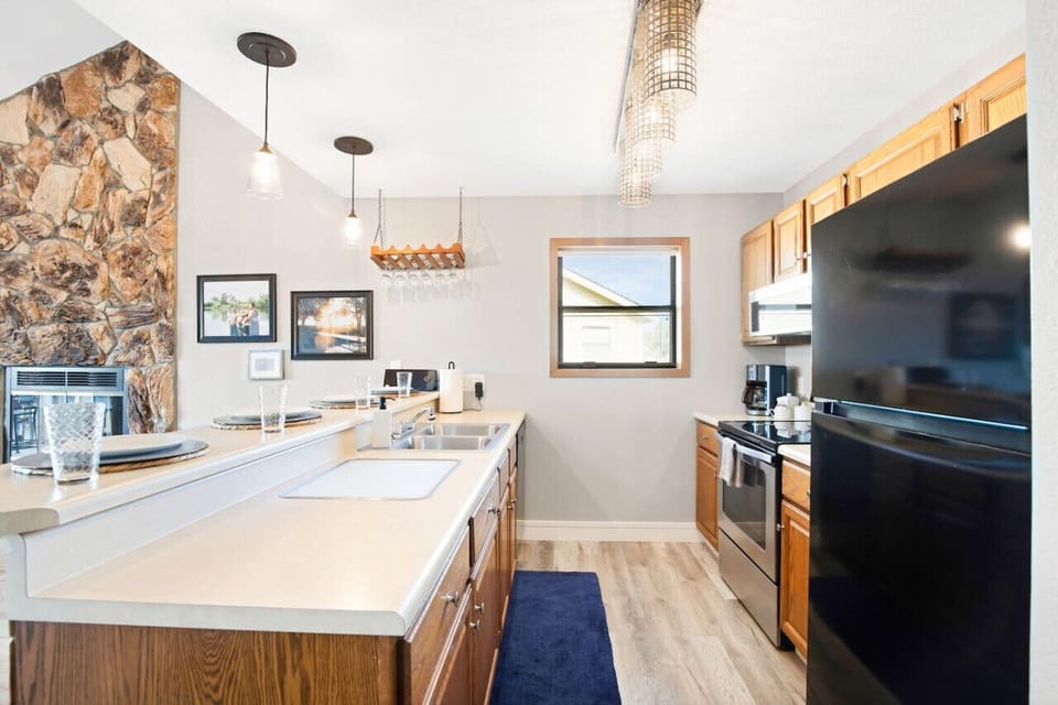 Fully equipped kitchen with modern amenities and a beautiful layout.