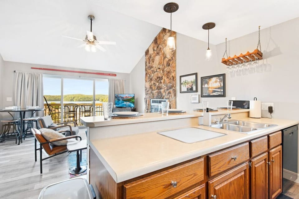 Prepare your favorite meals in the fully equipped kitchen with a bright and welcoming dining area.