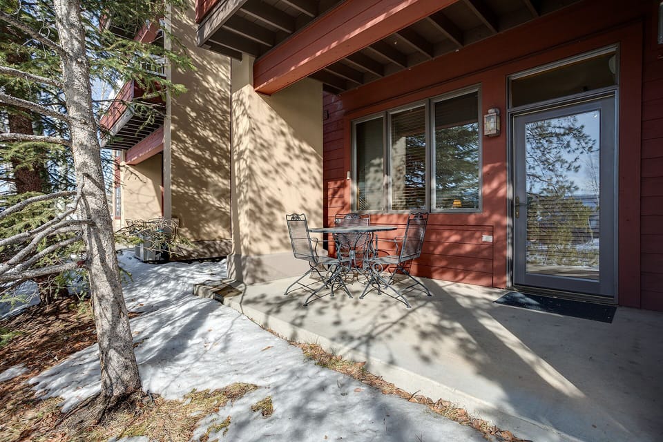 Step onto your private patio and breathe in the fresh mountain air while enjoying morning coffee at your outdoor dining table.