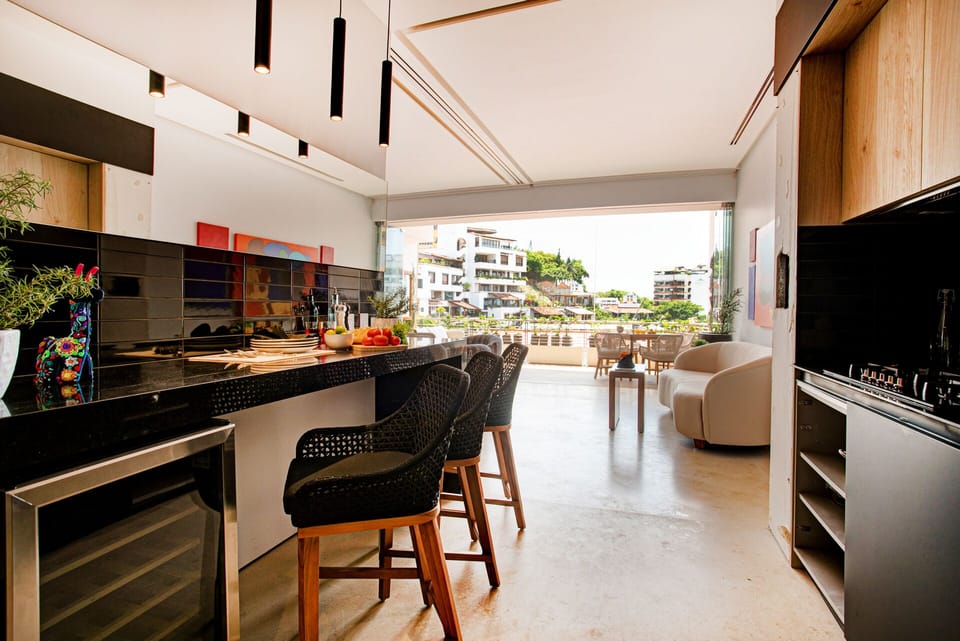 Kitchen amenities include a full-size refrigerator, stove, oven and dishwasher