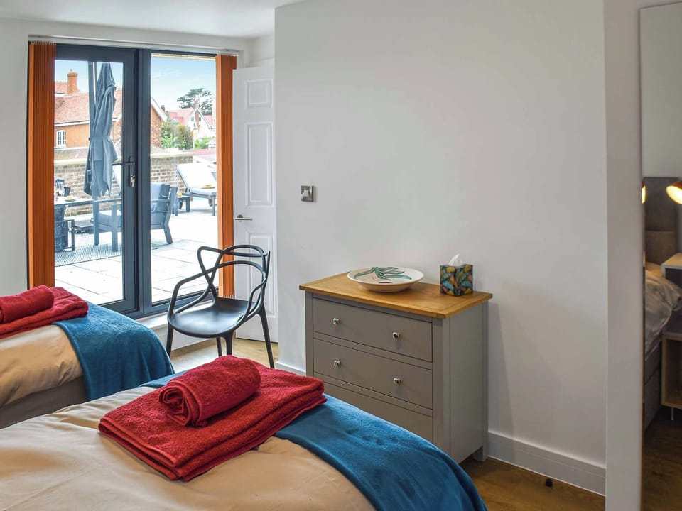 Twin bedroom with access to terrace | South Terrace, Sheringham