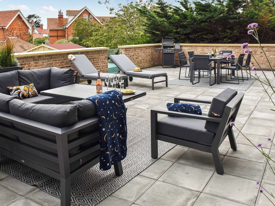 Spacious outside living and dinning area | South Terrace, Sheringham