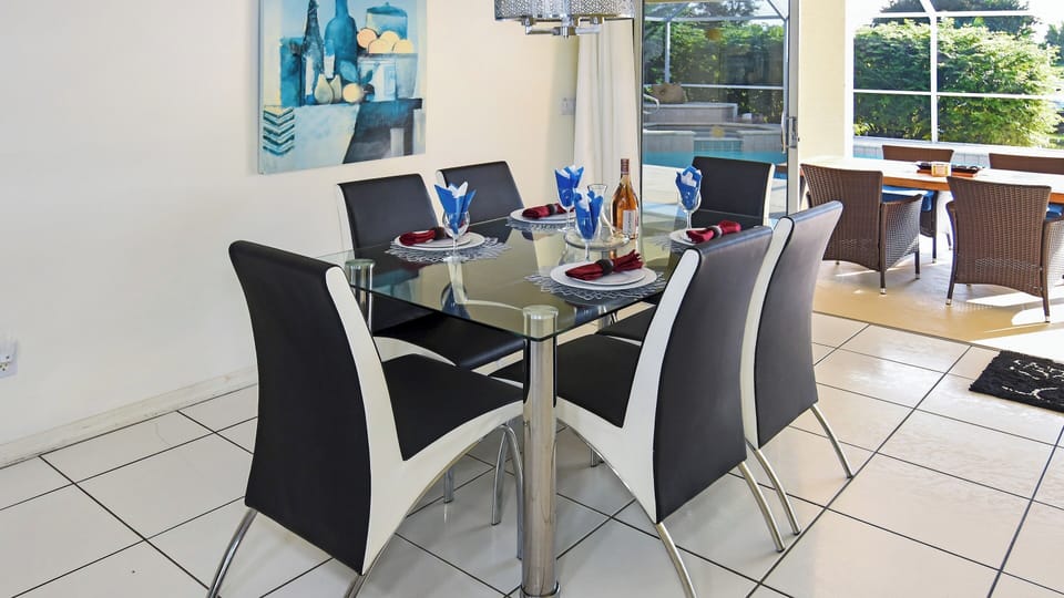 The dining room overlooks the attractive pool area