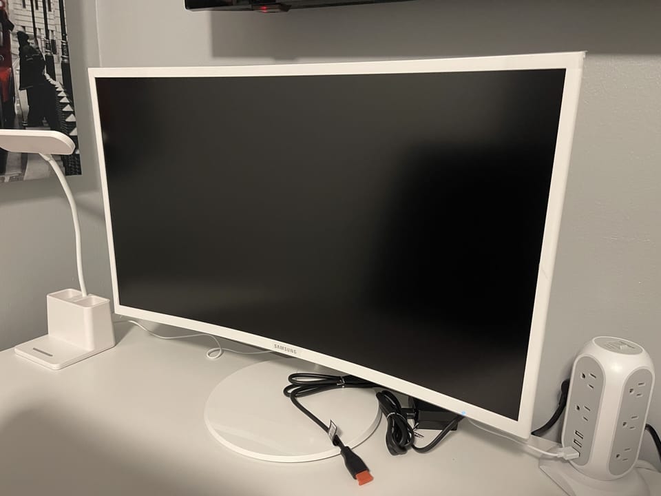 Curved Monitor for Guest Use