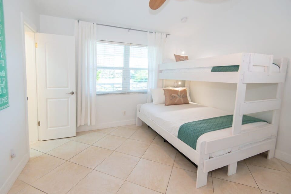 Comfortable bunk beds for kids and adults alike. Twin XL over Queen bunk beds with a twin trundle underneath. Invite the whole family!