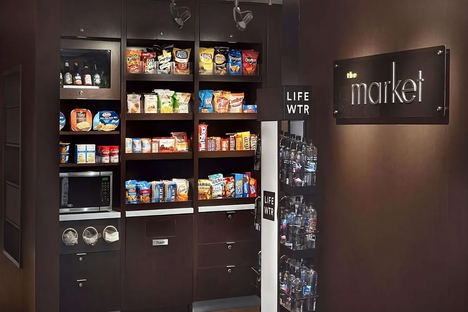 Grab late-night snacks and essentials anytime at the on-site market.