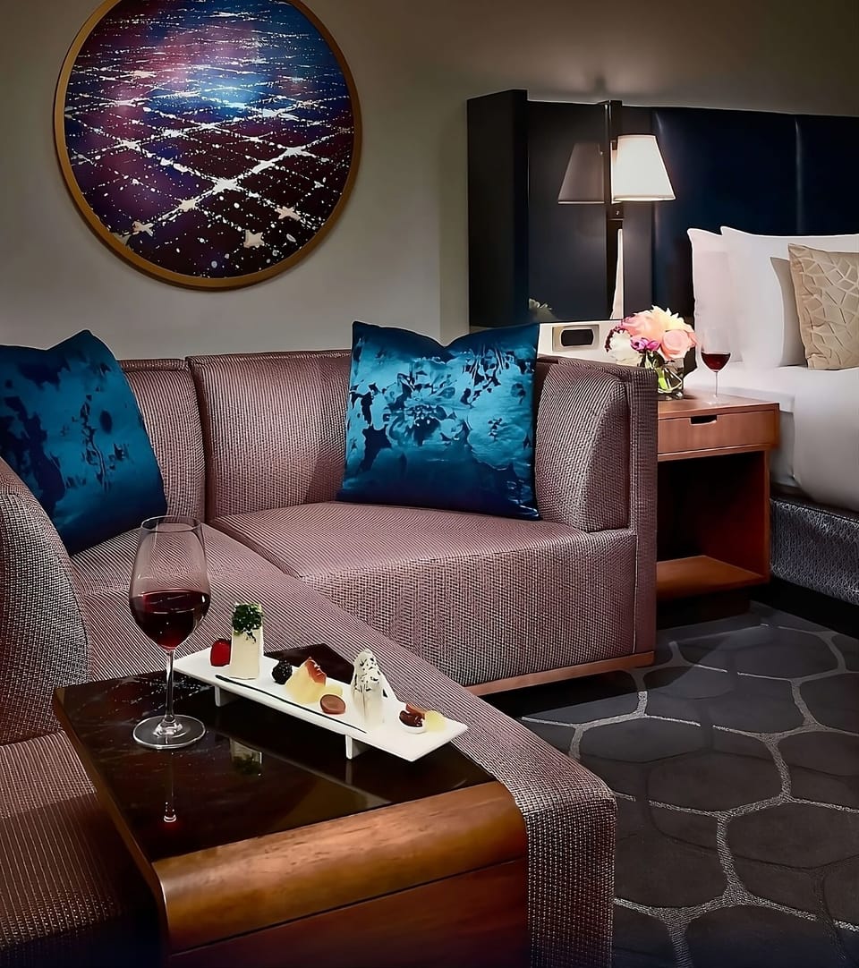 Sip wine and relax on a plush sofa after adventures.