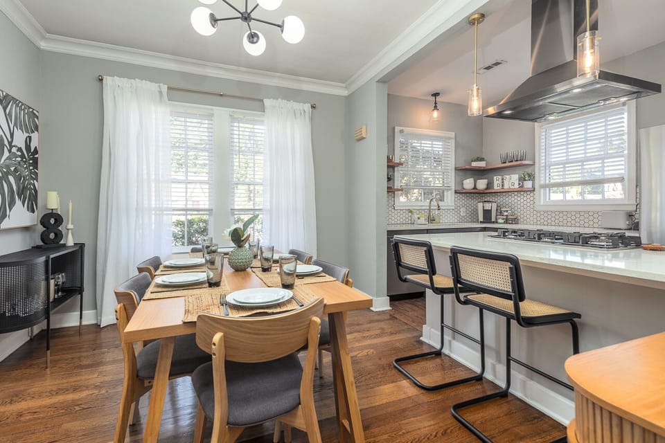 Dining by the kitchen bar with modern and sleek look. 
