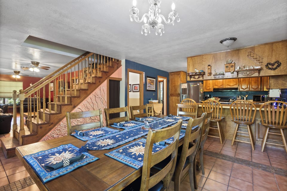 Open dining flows into fully equipped kitchen