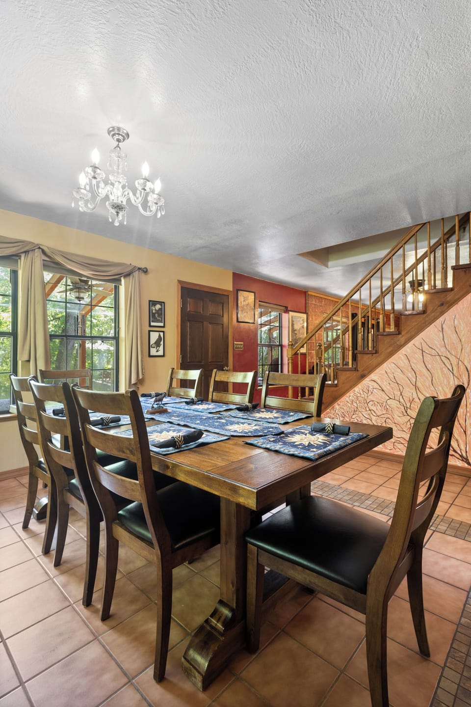 Dining room connects to kitchen with mountain light