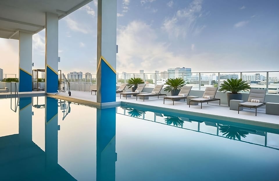 Float into a tranquil morning with airy rooftop pool serenity.