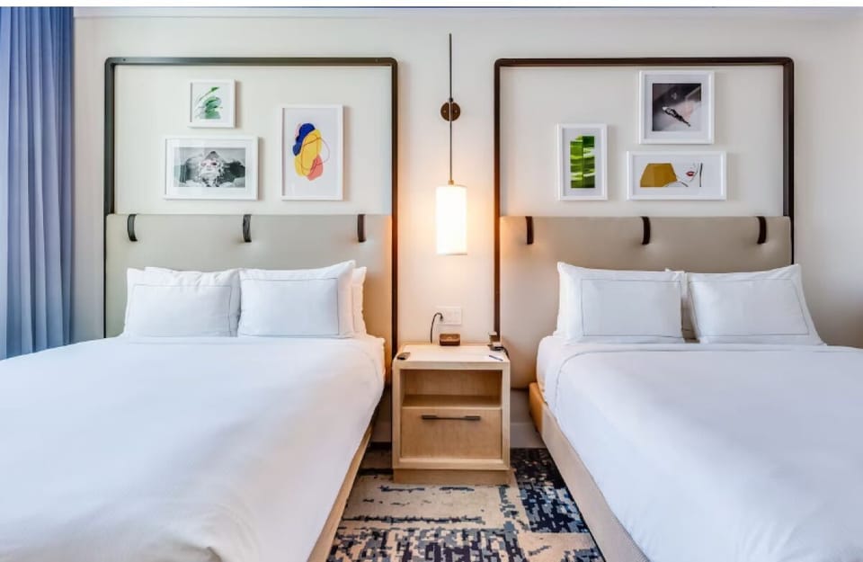 Spread out comfortably with two plush beds and soothing lighting.