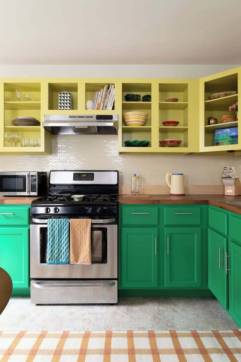 Tons of cabinet space and funky dishware.

French press and kettle. Chef knives set & pots and pans.