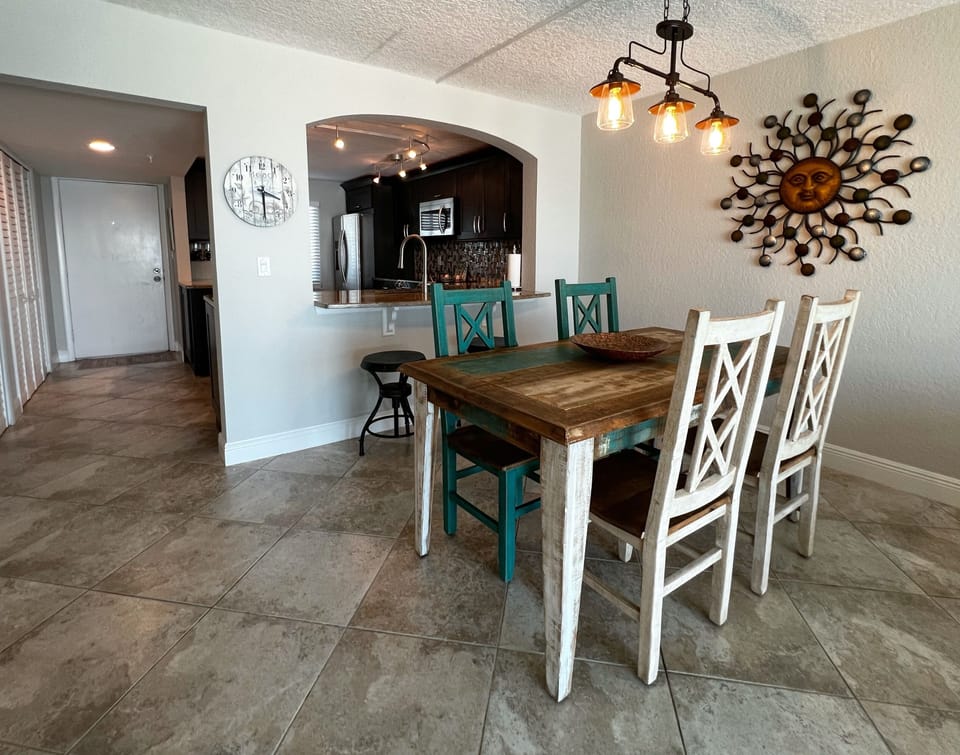 Dining table off the kitchen plus bar stool seating. - Dining table off the kitchen plus bar stool seating.
