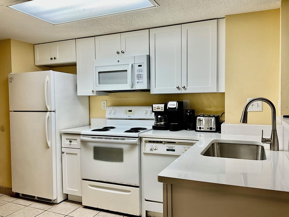 Full size Kitchen Appliances with Amenities for Cooking in your Home Away from Home