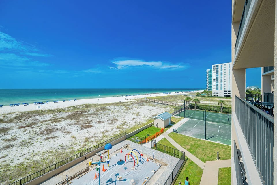 Enjoy the expansive beach views from your balcony while relaxing in the warm sun and gentle breezes