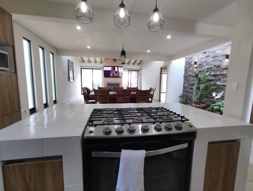This is a view from the kitchen. The home boasts an open concept.