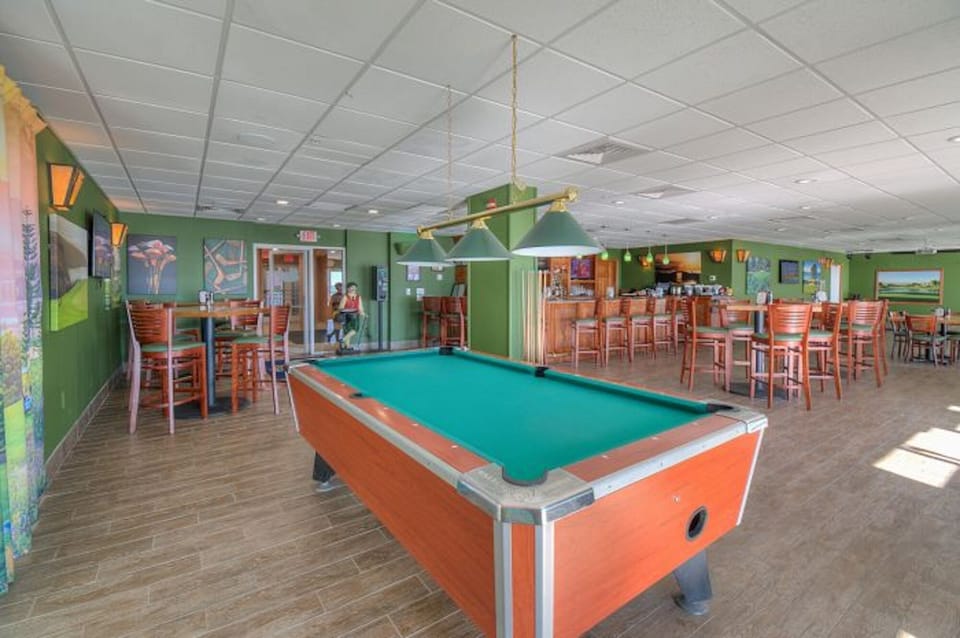 Challenge the kids to a game of pool.