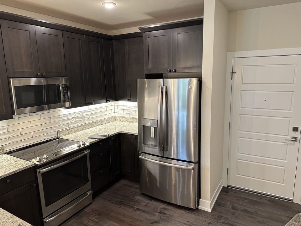 Modern fully stocked kitchen with everything you need for cooking at home.