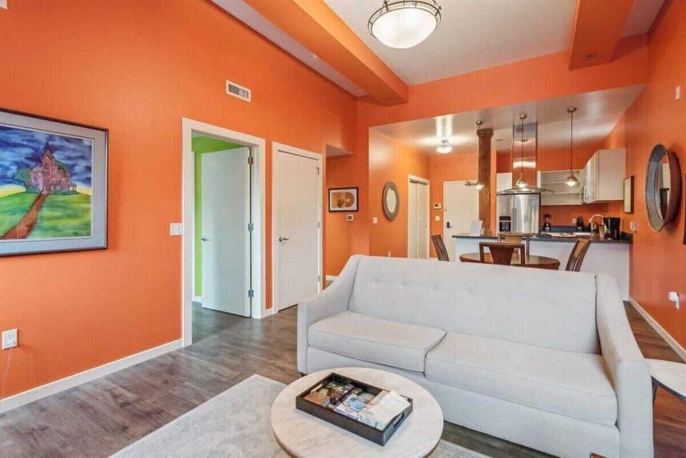 Vaulted ceilings and sunny orange walls.