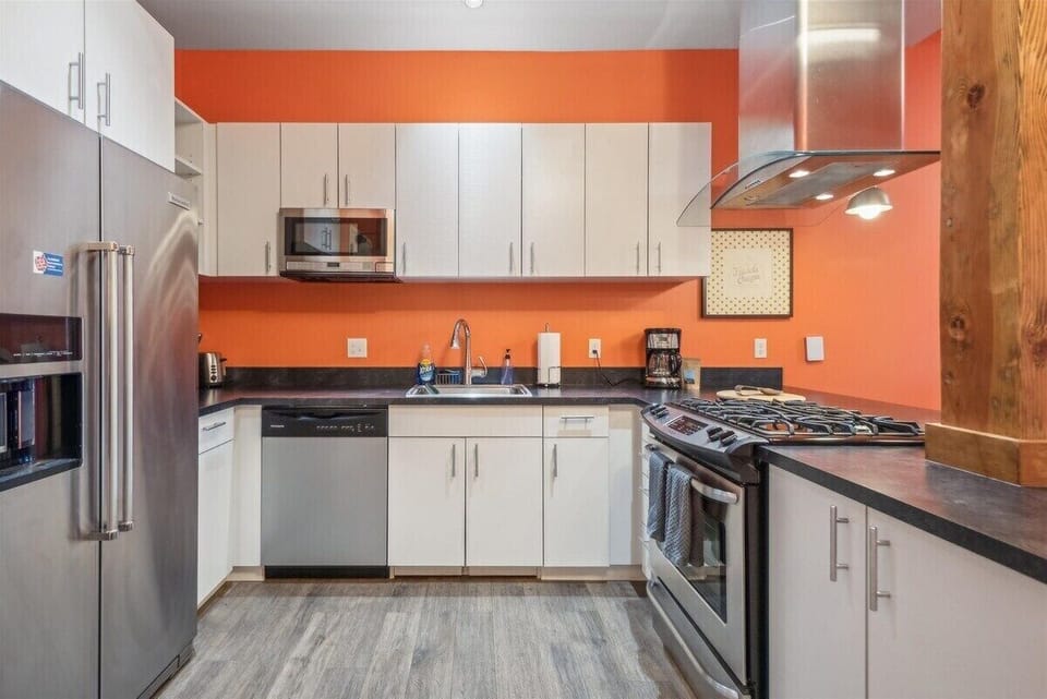 A bright, well-lit kitchen, clean surfaces, and a welcoming atmosphere perfect for cooking and gathering.