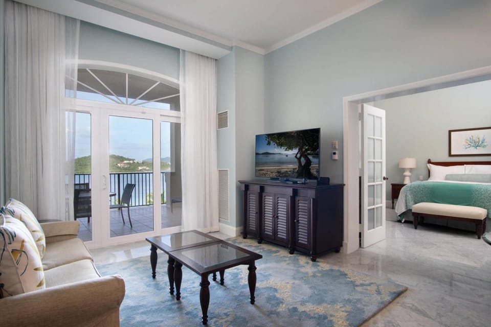 Living Room and door to the furnished patio/balcony.