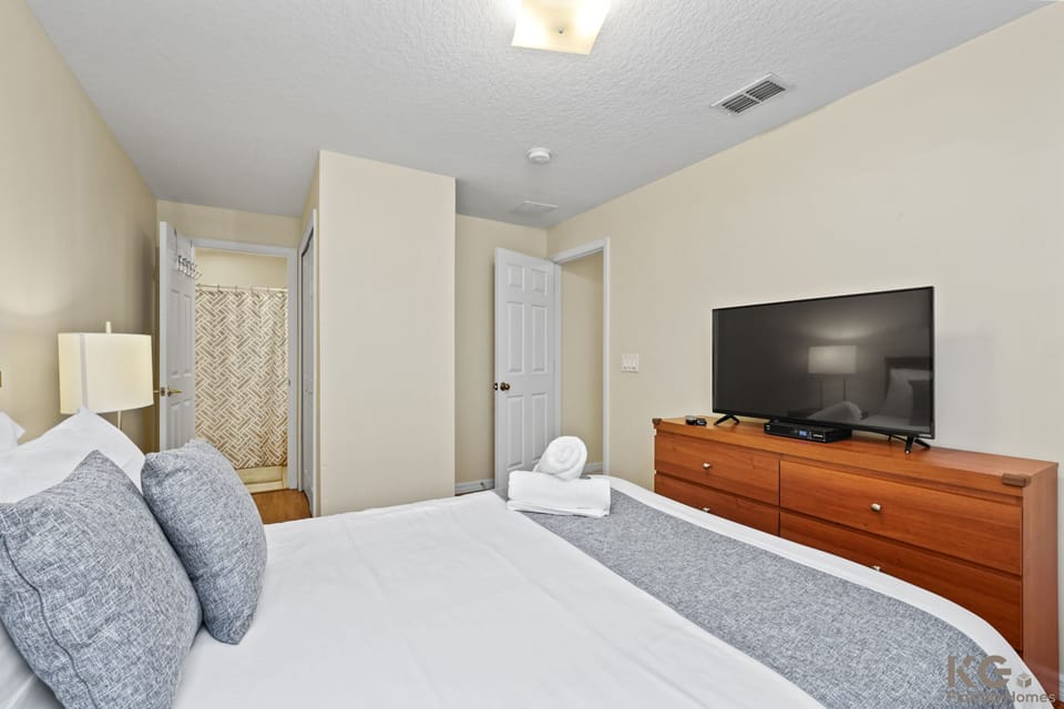 A TV and bed to enjoy with loved one