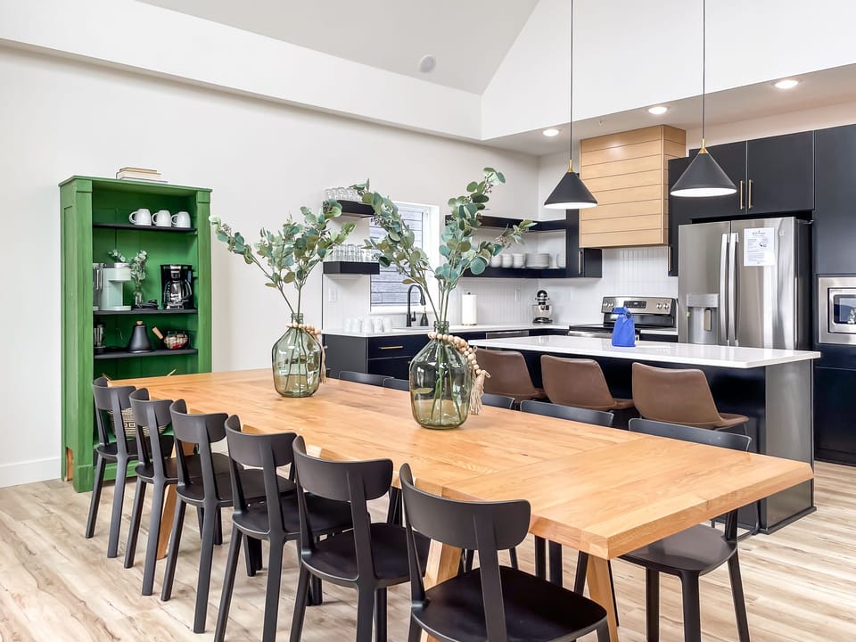 Main level open concept dining and kitchen with abundant seating