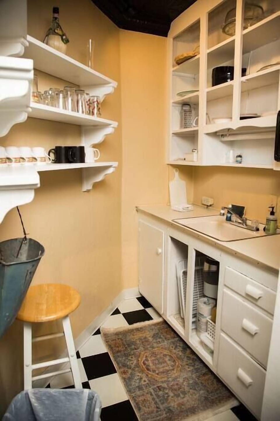 The pantry located off the kitchen has all of the essentials. 