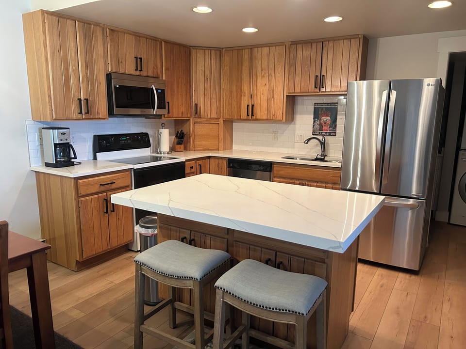 Spacious kitchen with quartz countertops