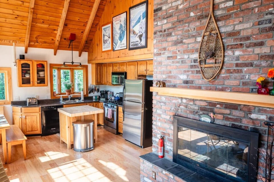 Fireplace on the main floor, perfect for chilly evenings.
