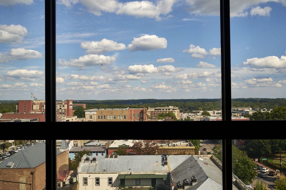 Enjoy a stunning view of downtown Athens as you exit elevator to 9th floor. 