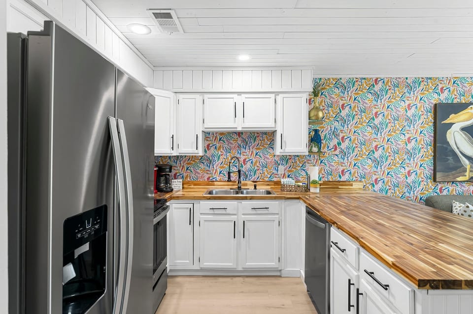 Open Concept- Living/ Kitchen/ Dining/ Queen Sleeper 
