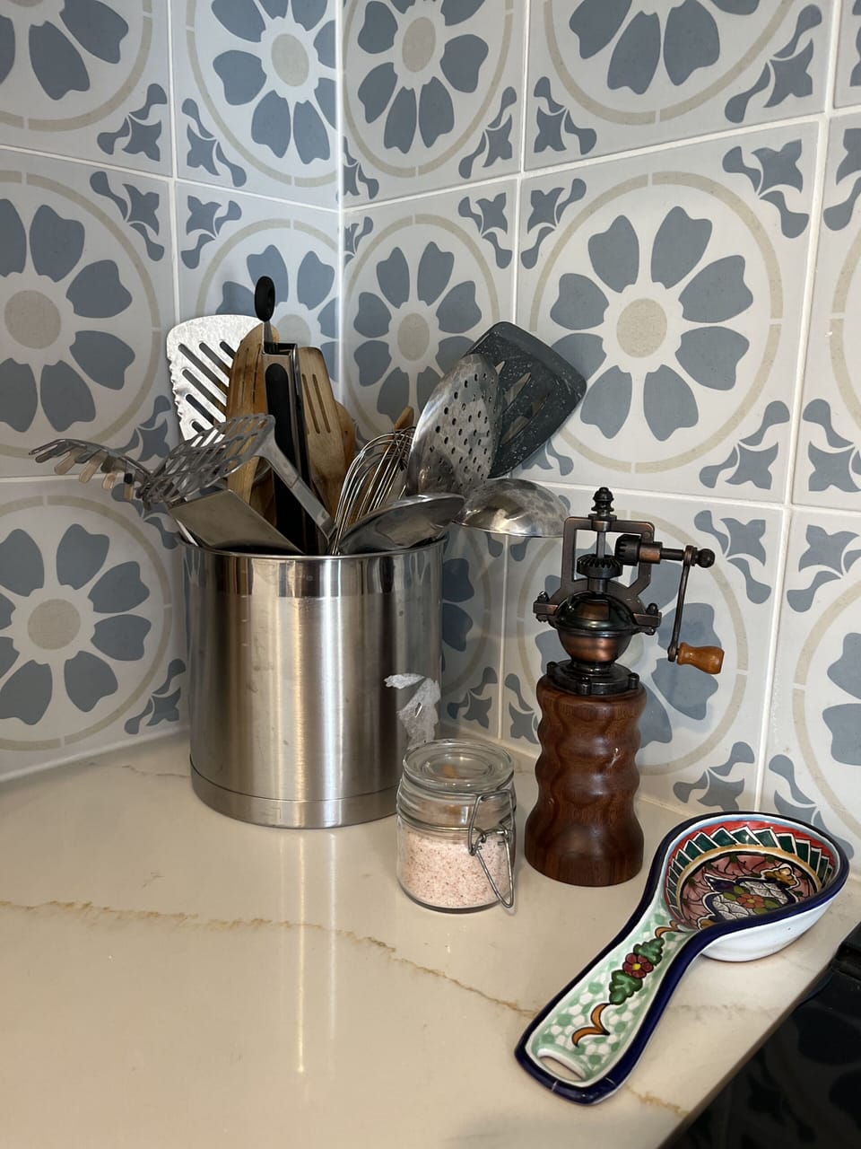 Fully stocked with cooking utensils.