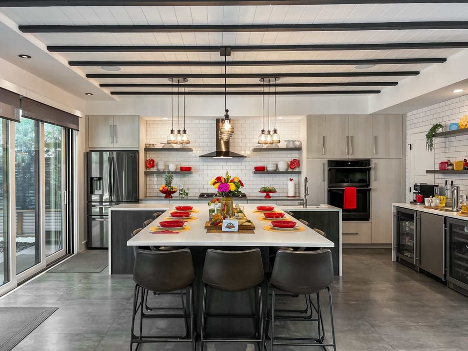 A fully-equipped chef's kitchen and bar area...