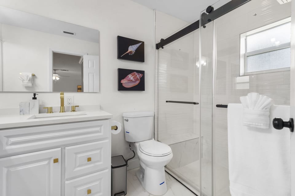 Master Bathroom 1 with double sinks and a shower.