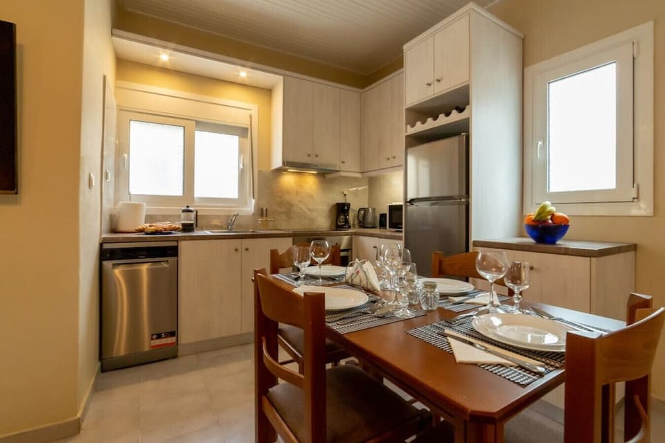Open floor plan with living, dining and kitchen.