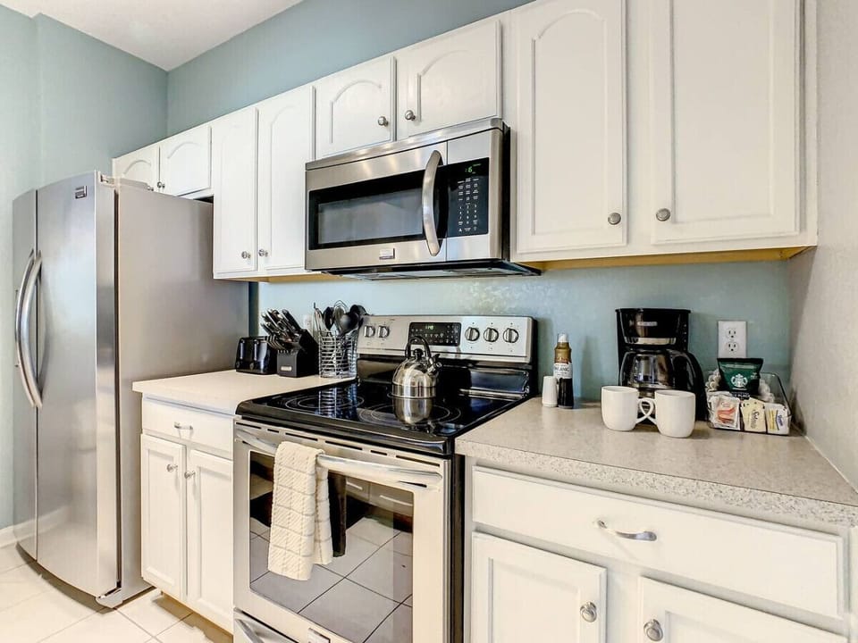 Cook up something special in this fully equipped kitchen, designed for convenience and style.