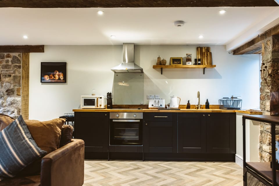 Kitchen includes:induction hob, oven, microwave, coffee machine, toaster, kettle